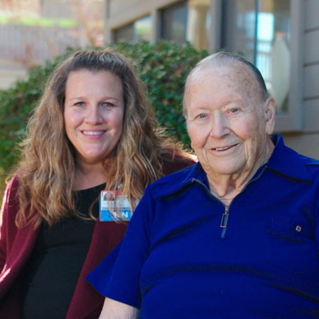 Provider sitting with patient